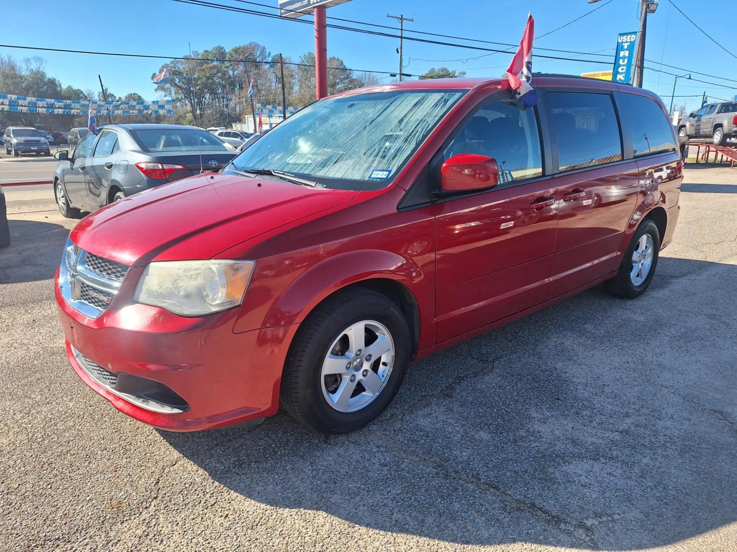 2013 RED /Black Cloth DODGE GRAND CARAVAN SXT SXT (2C4RDGCG9DR) with an 3.6L V6 DOHC 24V engine, 6-Speed Automatic transmission, located at 900 East Davis Street, Conroe, TX, 77301, (936) 539-9909, 30.314880, -95.446770 - Photo#0